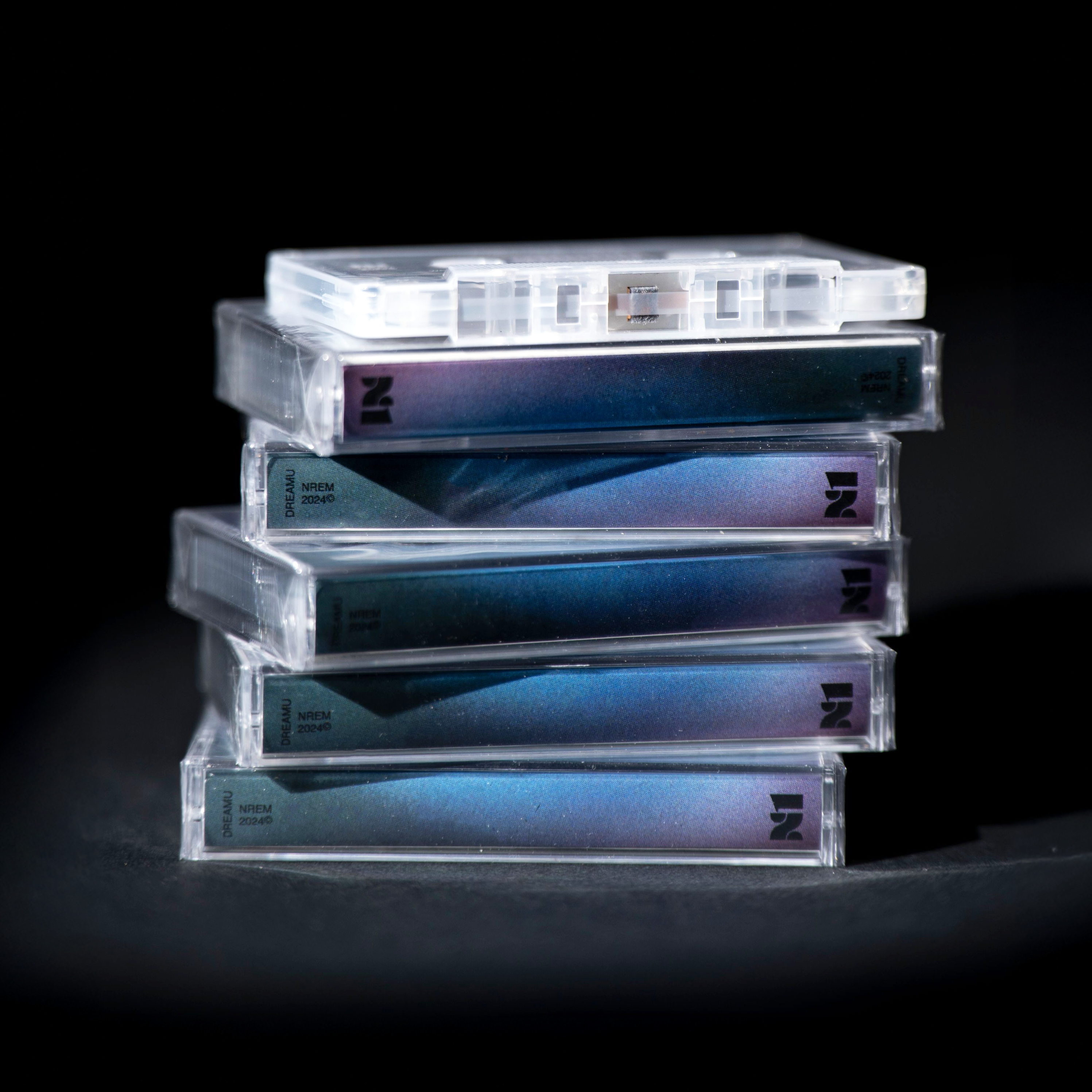 Stylized blue and pink image of a whiskey glass with the wordmark of Vèloce in pink all-caps letters above.